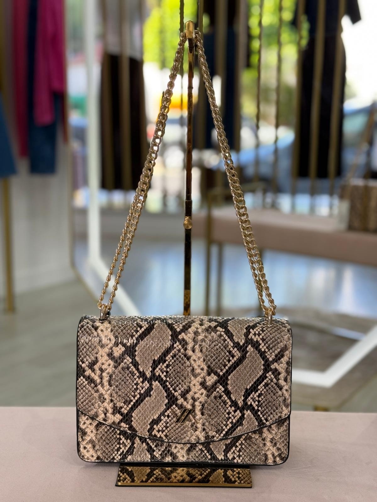 Mala tiracolo padrão cobra