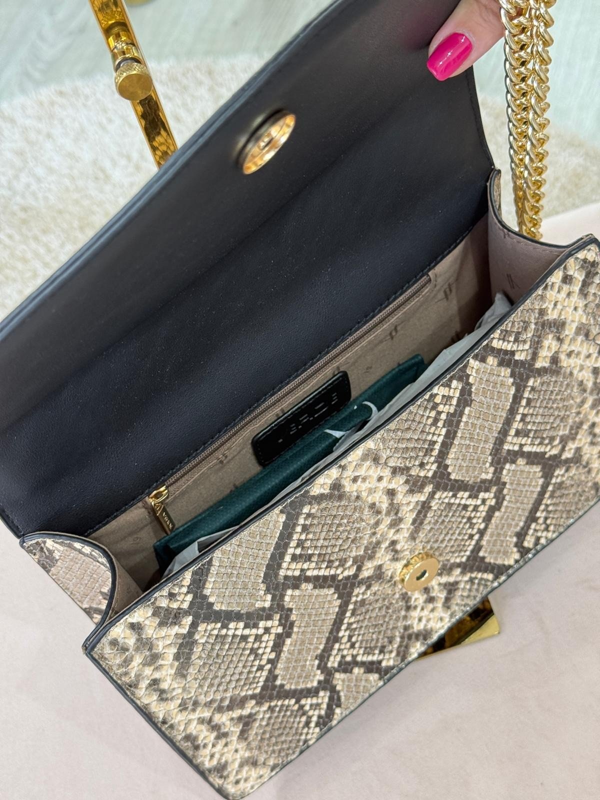 Mala tiracolo padrão cobra