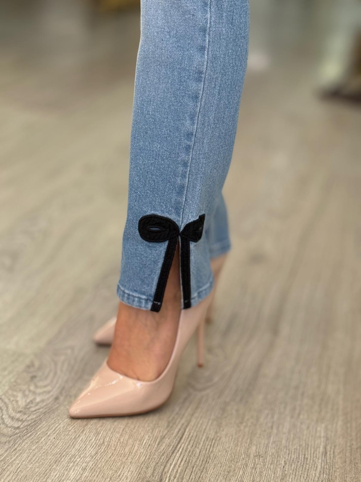 Calças de ganga laço