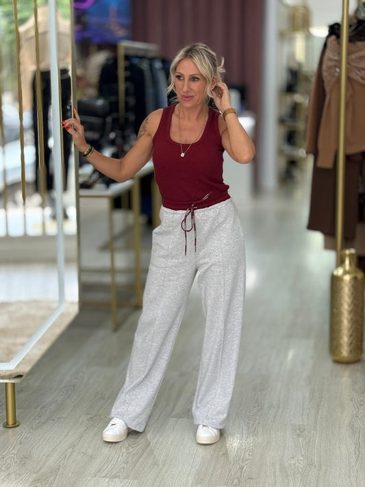 Calças jogger em cinzento claro com cintura contrastante