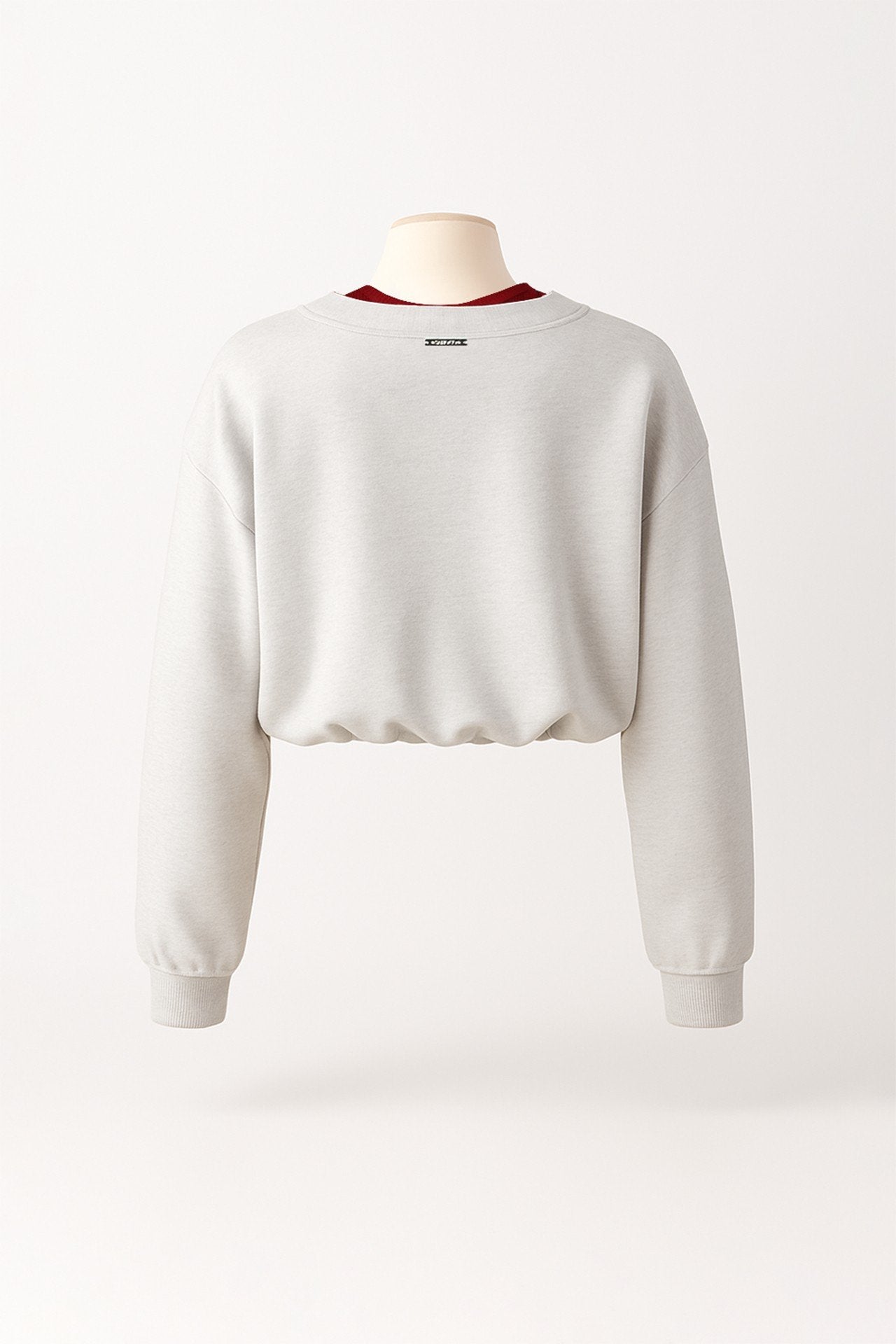 Sweatshirt cropped em cinzento com decote em V