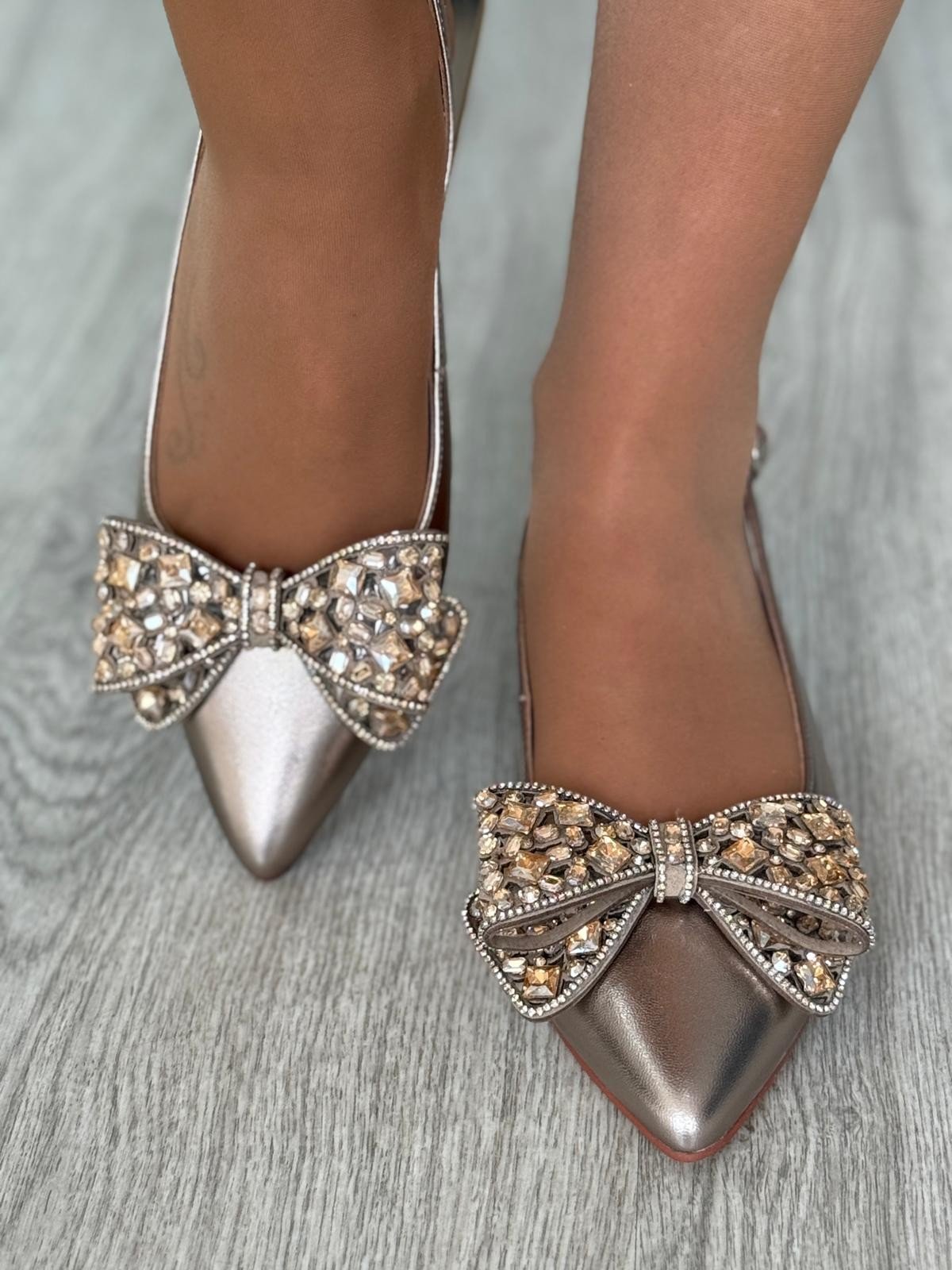 Sapatos rasos com laço