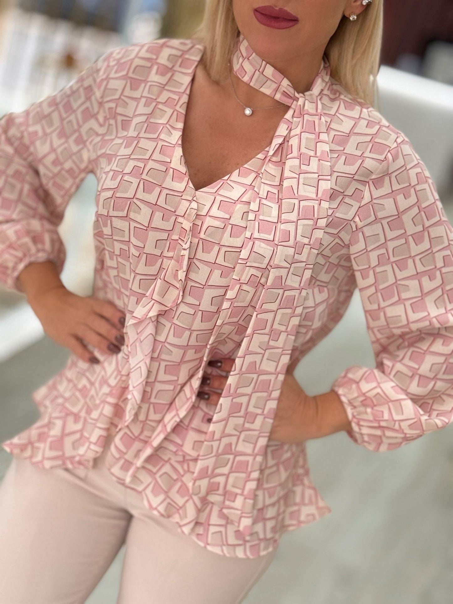 Túnica estampada folhos e laçada