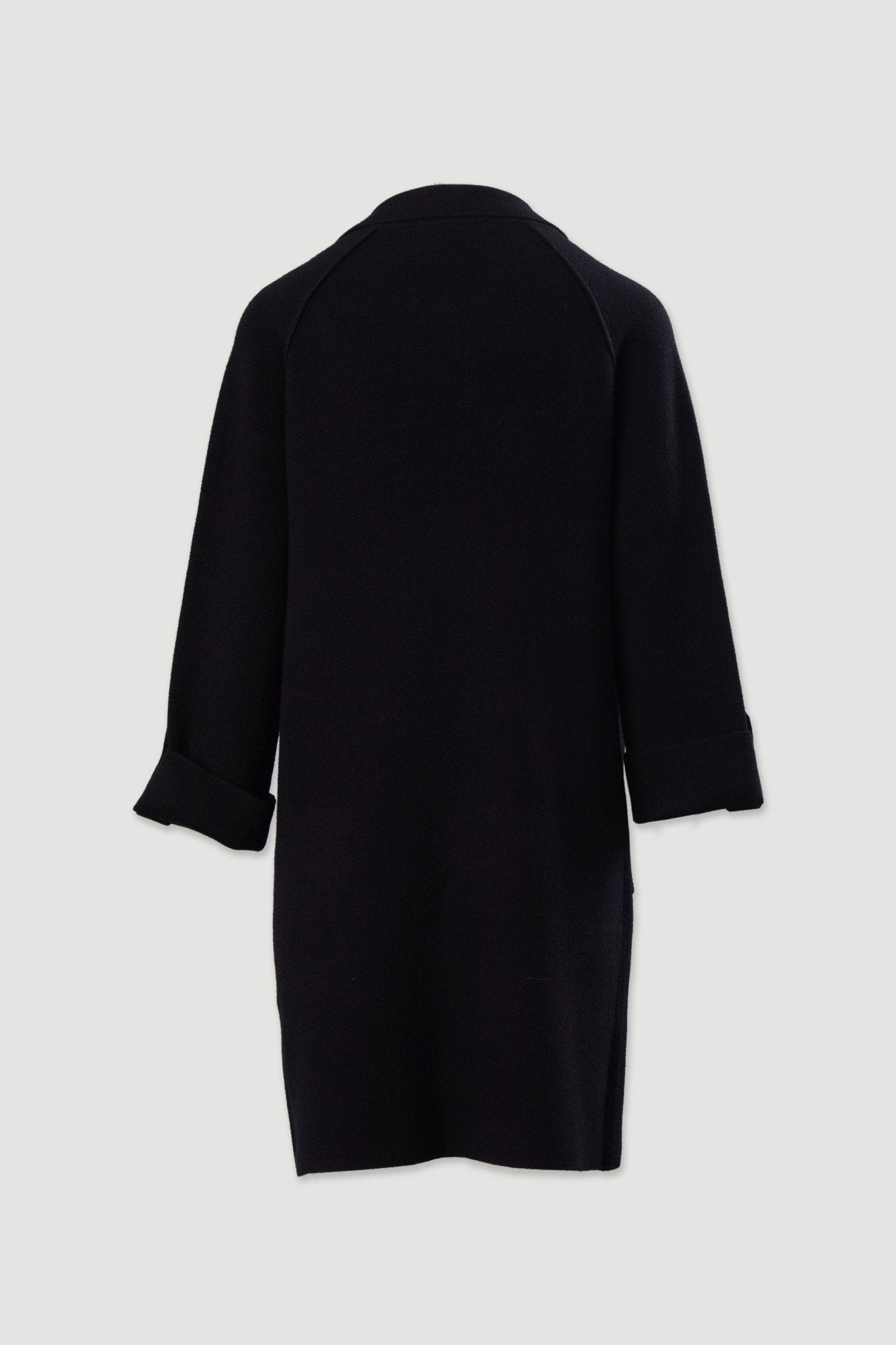 Casaco comprido em malha com bolsos frontais