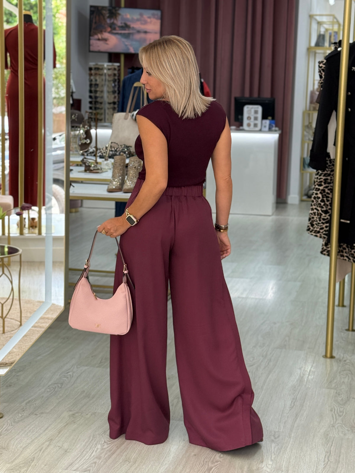 Calça pantalona de cintura subida