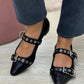 Sapatos pretos com fivela