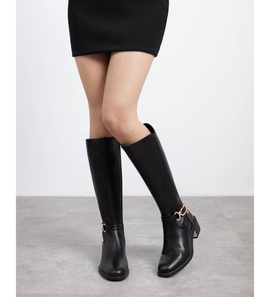 Botas cano alto