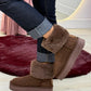Botas bege com pelo
