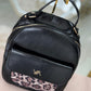 Mochila efeito pele com animal print (+ cores)