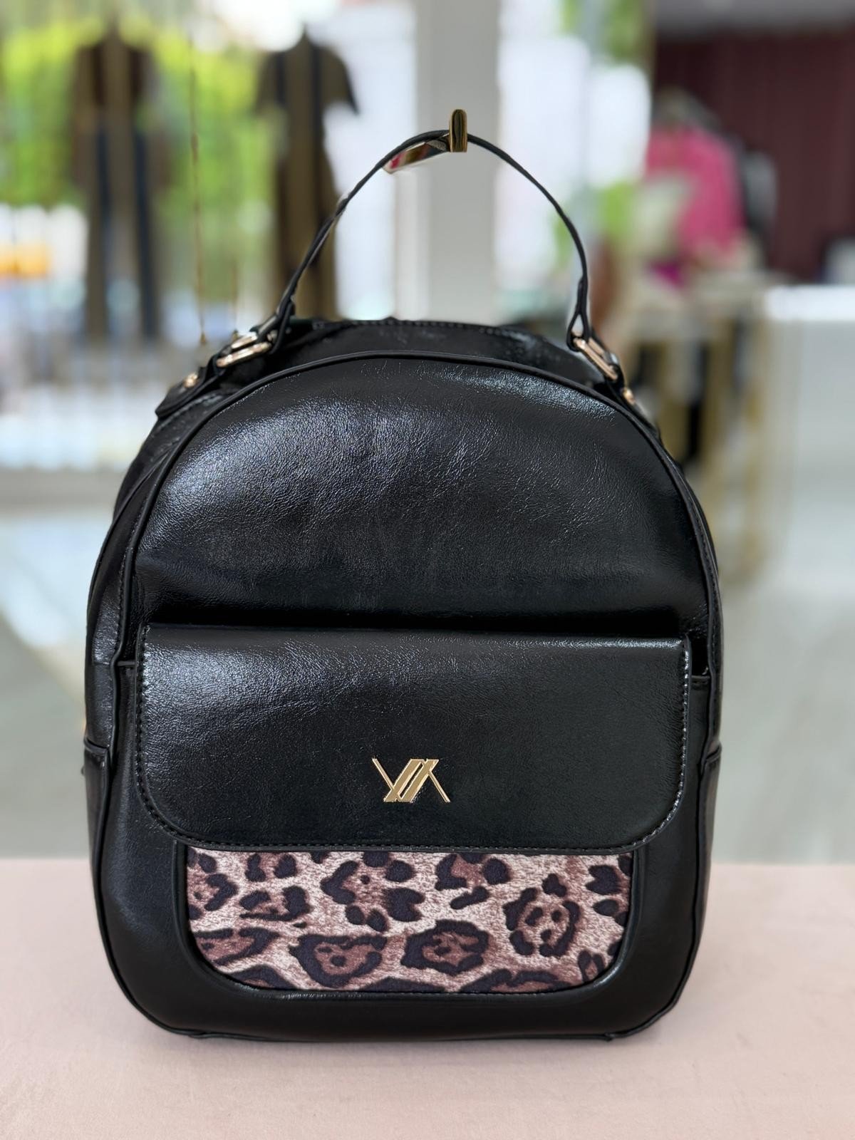 Mochila efeito pele com animal print (+ cores)