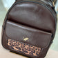 Mochila efeito pele com animal print (+ cores)