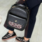 Mochila efeito pele com animal print (+ cores)