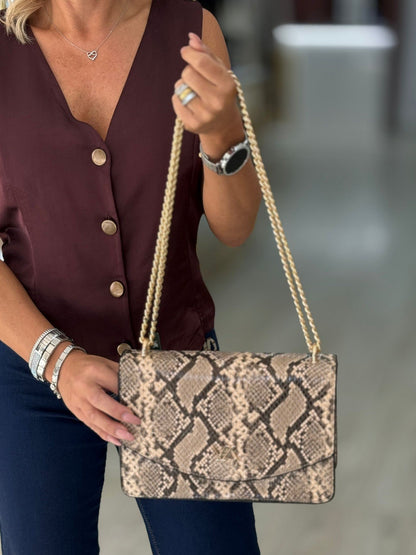 Mala tiracolo padrão cobra