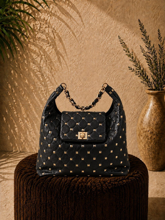 Mala macia com tachas