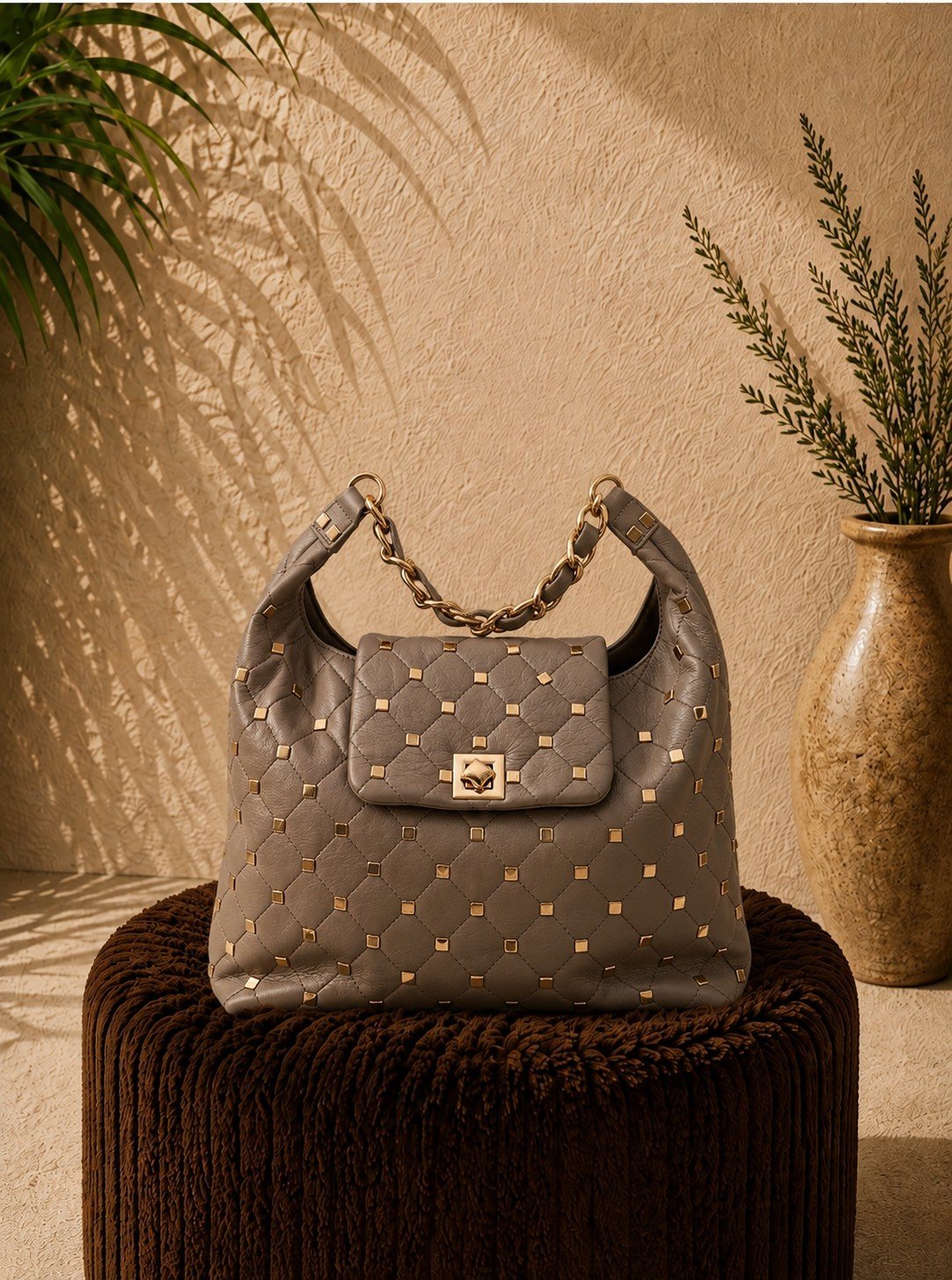 Mala macia com tachas