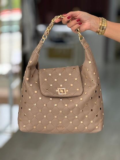 Mala macia com tachas