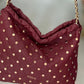 Mala tipo saco com tachas