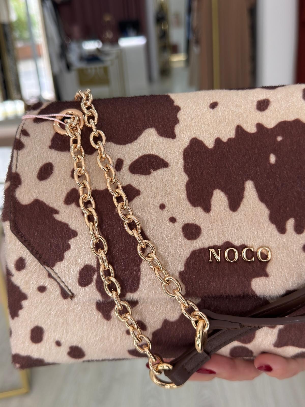 Bolsa a tiracolo com aba e estampado