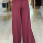 Calça pantalona de cintura subida
