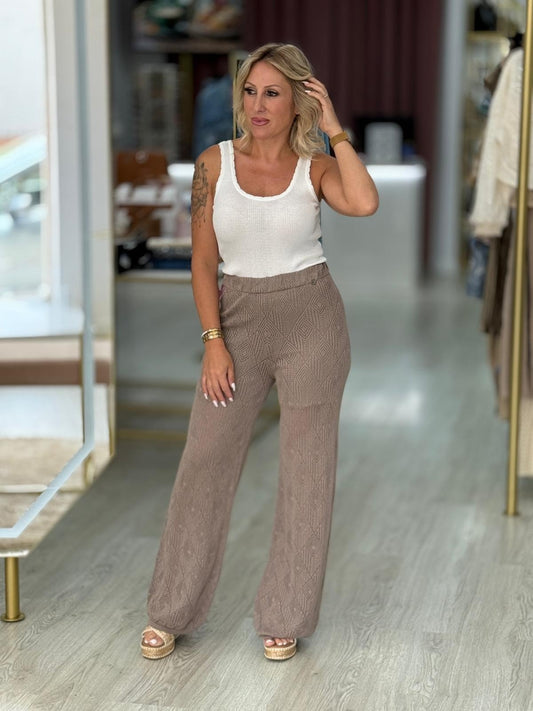 Calças de malha perfuradas