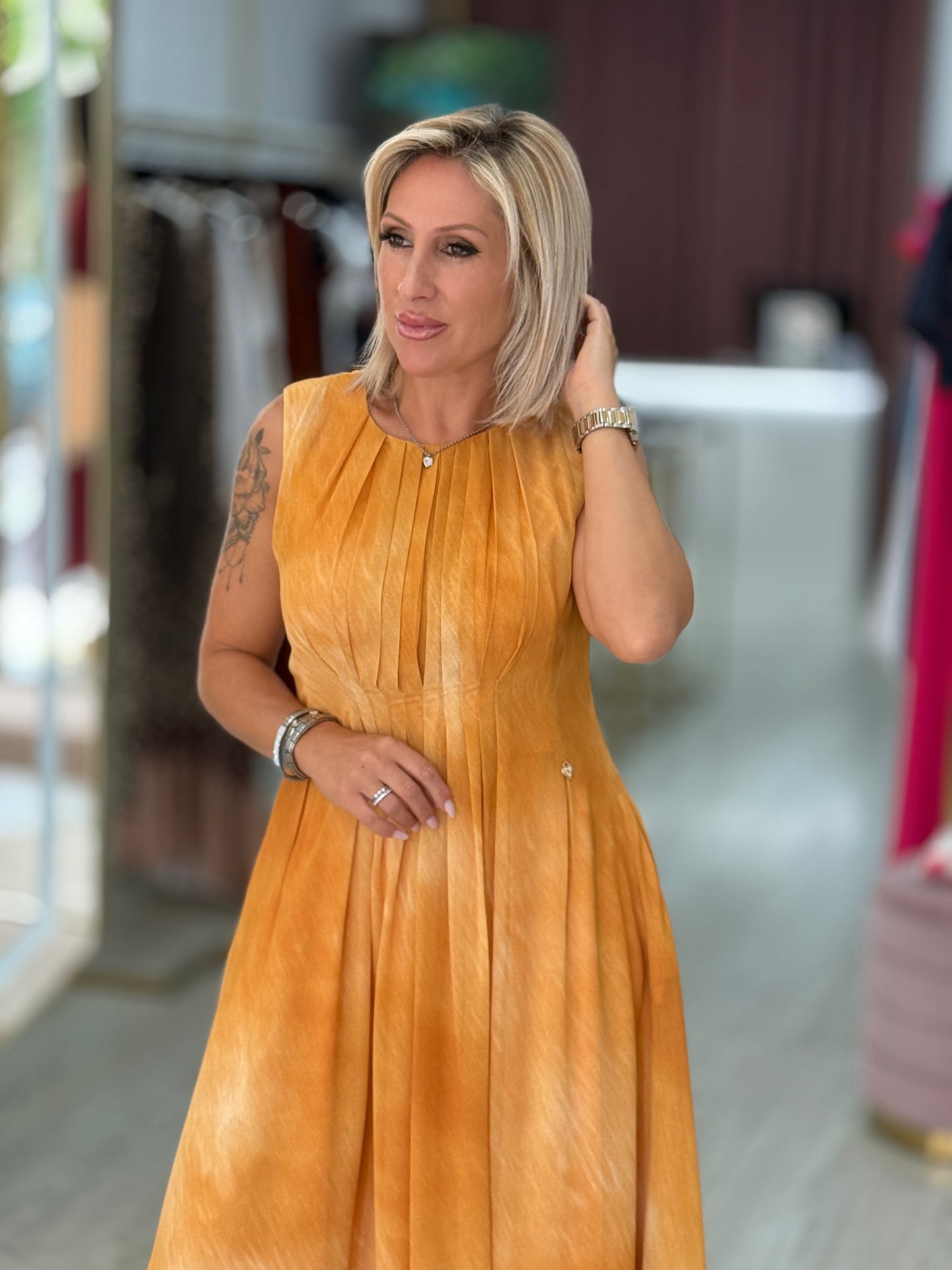 Vestido midi plissado