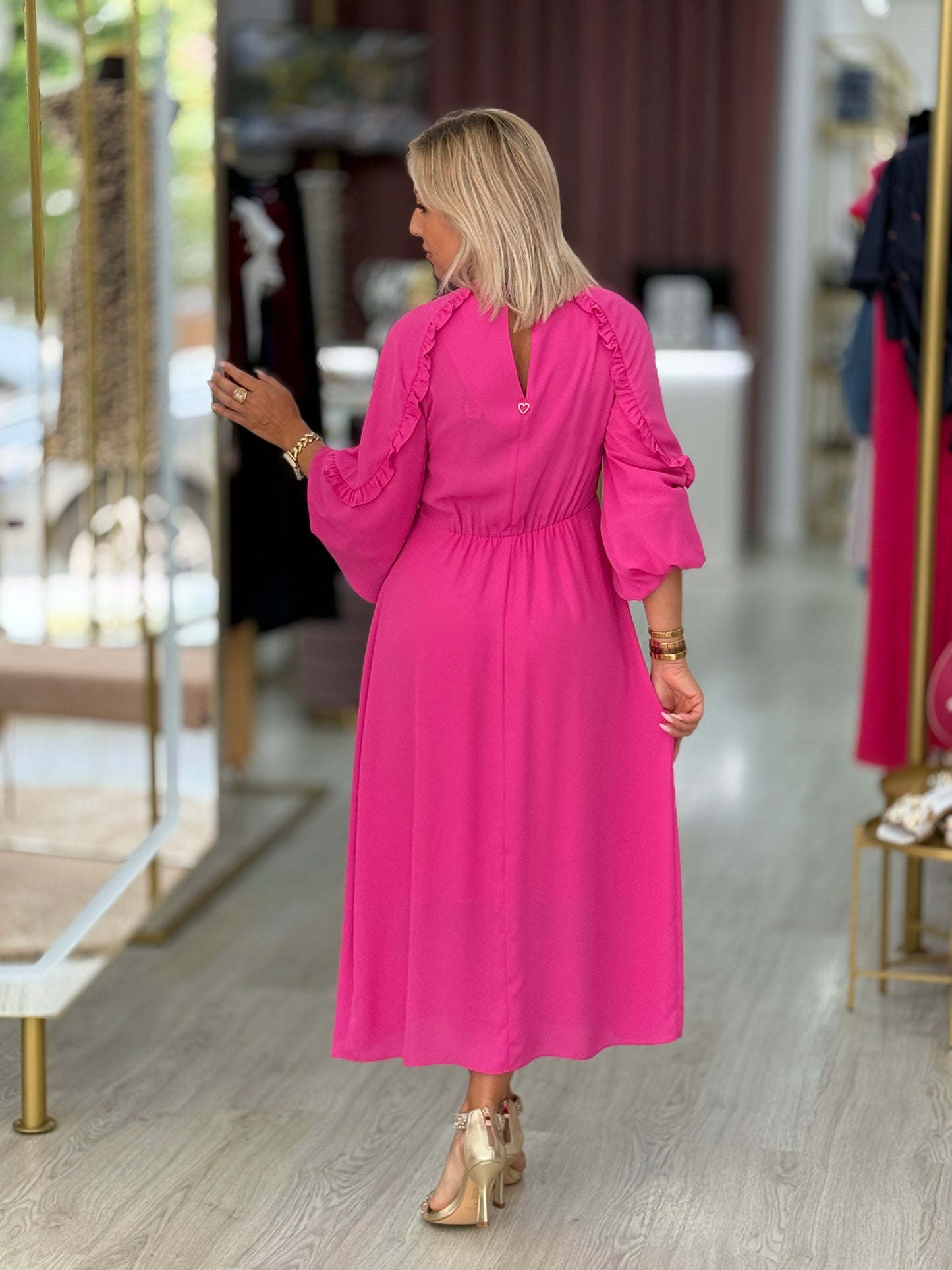Vestido comprido com folhos