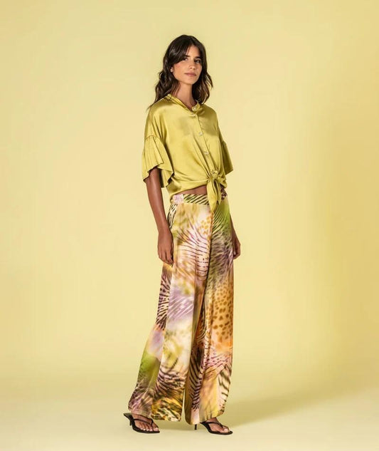 Calças largas com estampado tropical