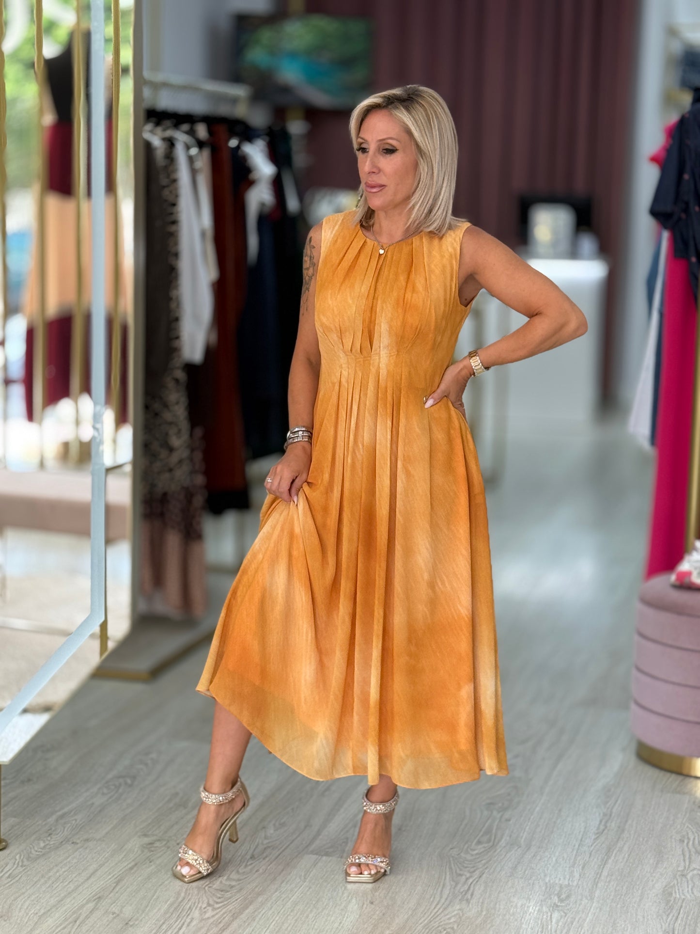Vestido midi plissado
