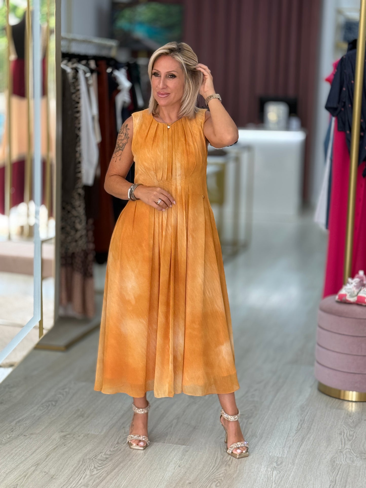 Vestido midi plissado