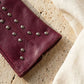 Luvas de couro vegan com tachas