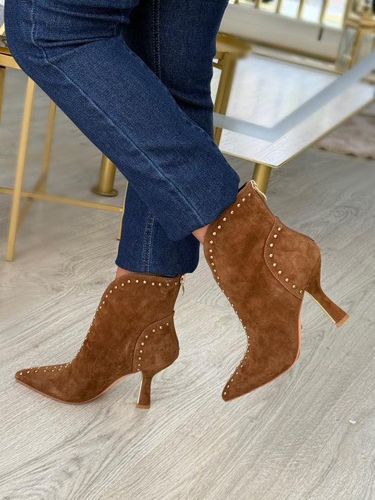BOTA DE NAPA COM TACHAS