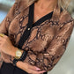 Blusa estampada de decote em V com laçada
