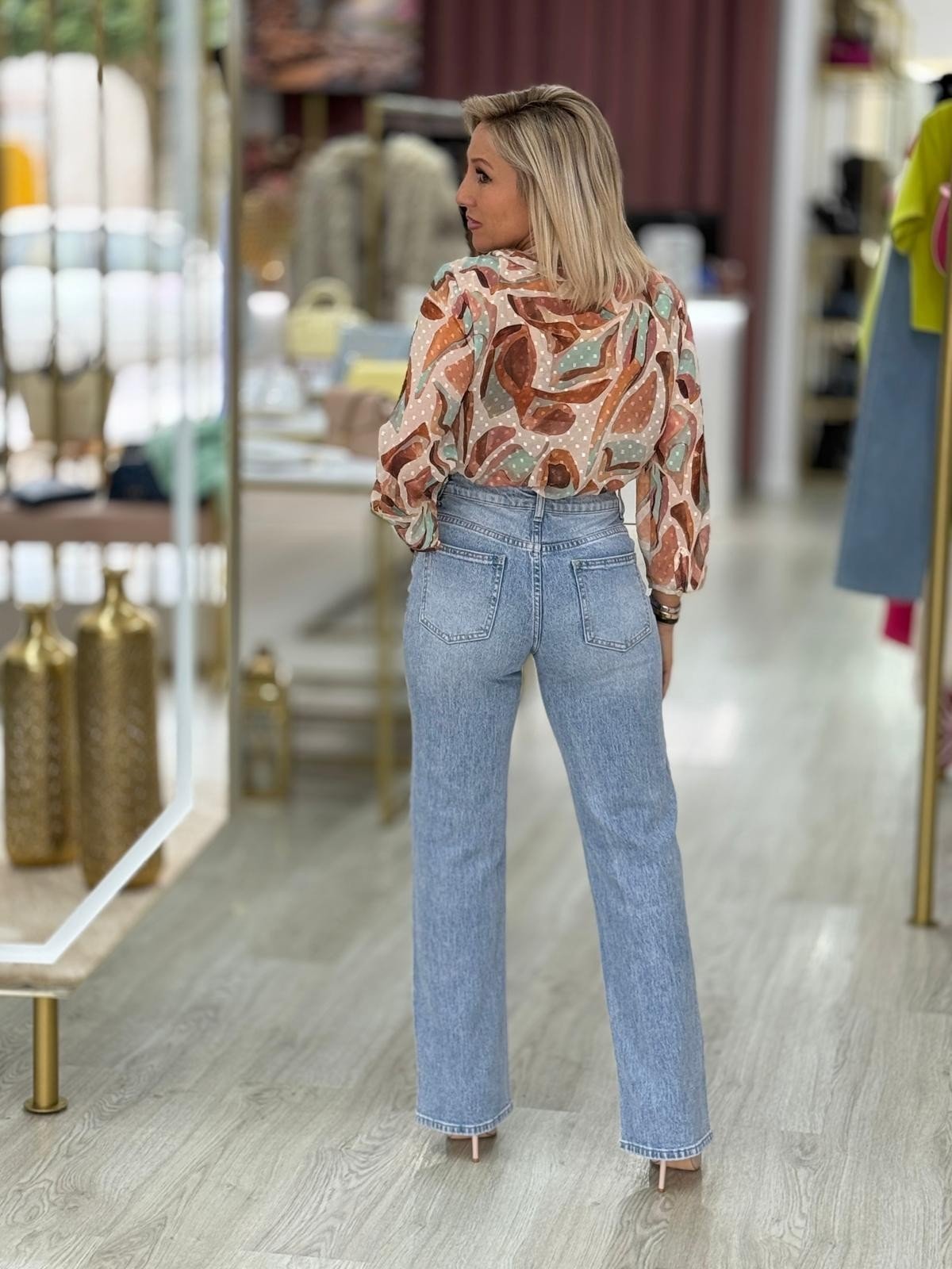 Calças de ganga com corrente