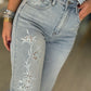 Calças de ganga com bordado e strass