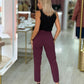 Calça clássica de cintura subida com detalhe elástico