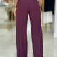 Calça clássica wide leg com detalhe de abertura