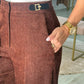 Calça wide leg com fivelas laterais