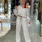 Calças jogger em cinzento claro com cintura contrastante