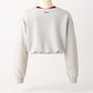 Sweatshirt cropped em cinzento com decote em V