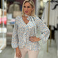 Túnica estampada folhos e laçada