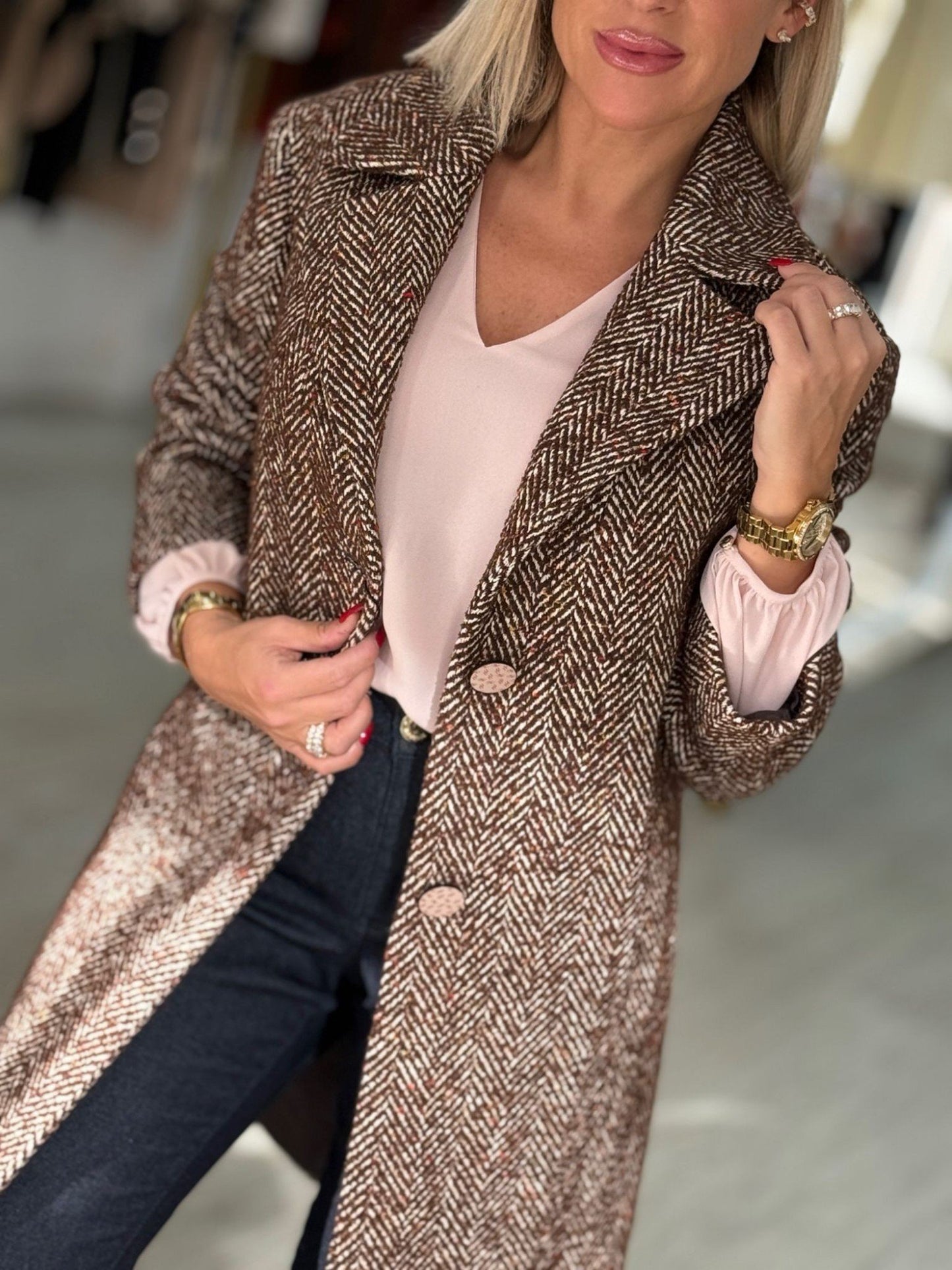 Casaco de fazenda em tweed com padrão espinha