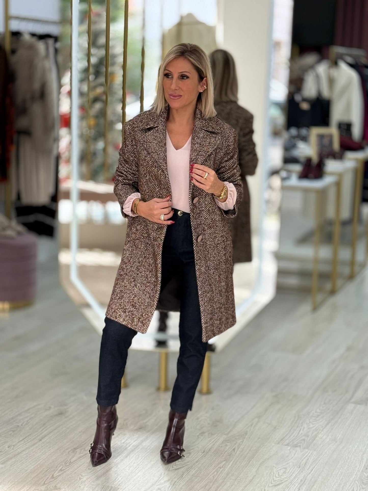 Casaco de fazenda em tweed com padrão espinha