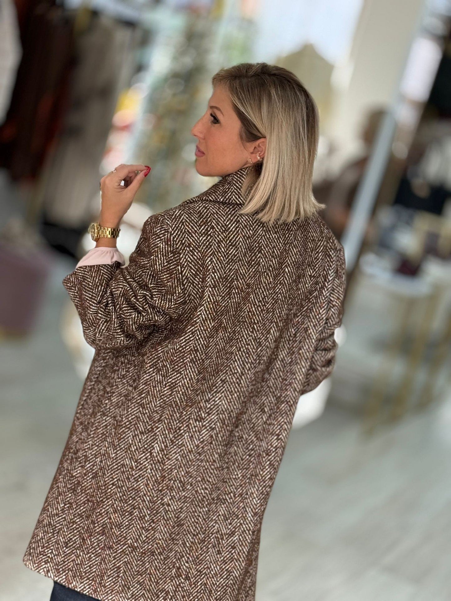 Casaco de fazenda em tweed com padrão espinha