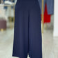 Calça curta wide leg com pregas frontais