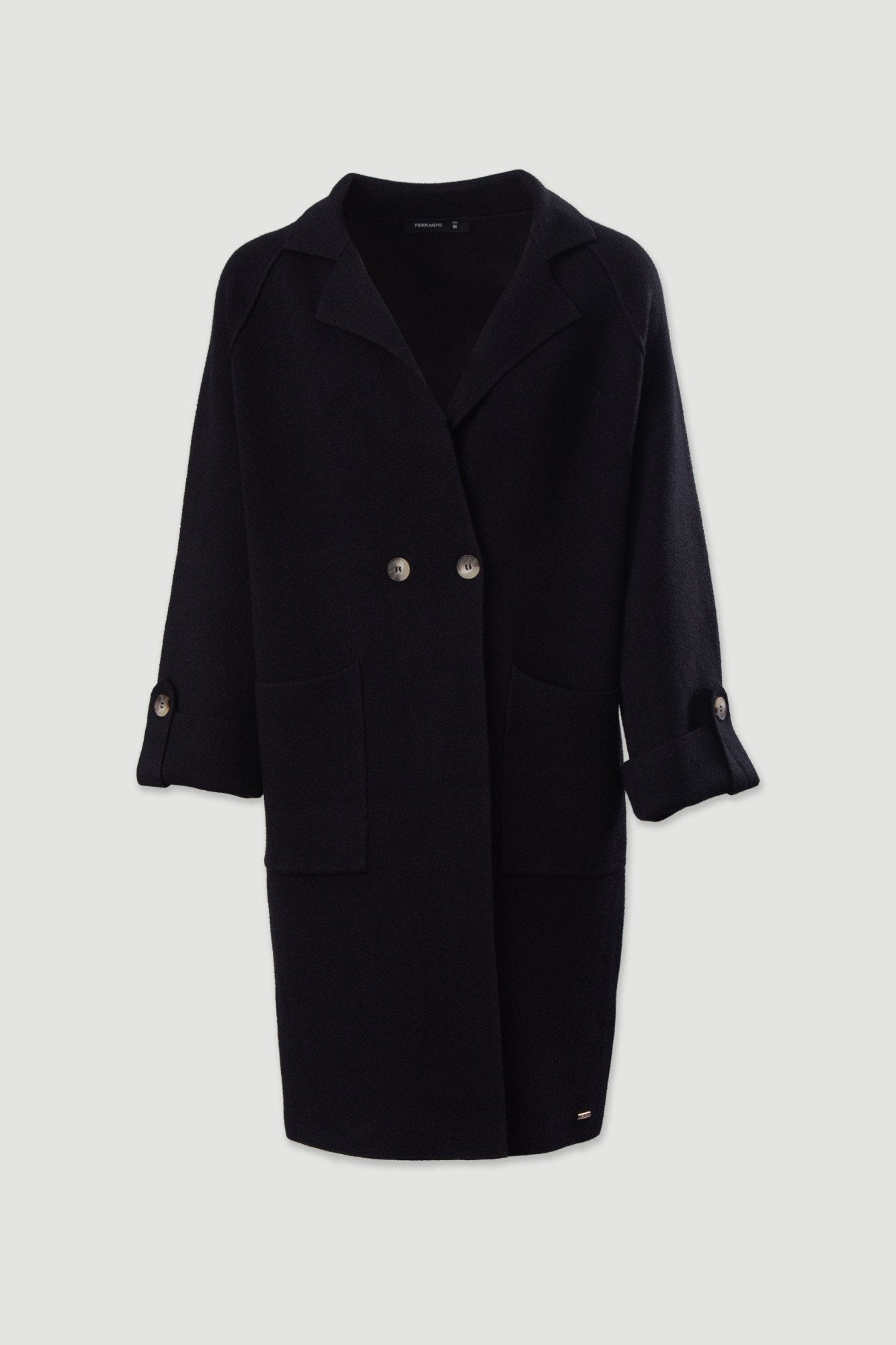 Casaco comprido em malha com bolsos frontais