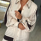 Blusa acetinada